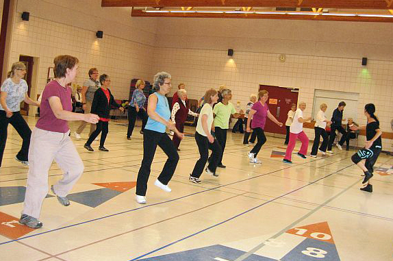 Zumba class Older adults taking a fitness course