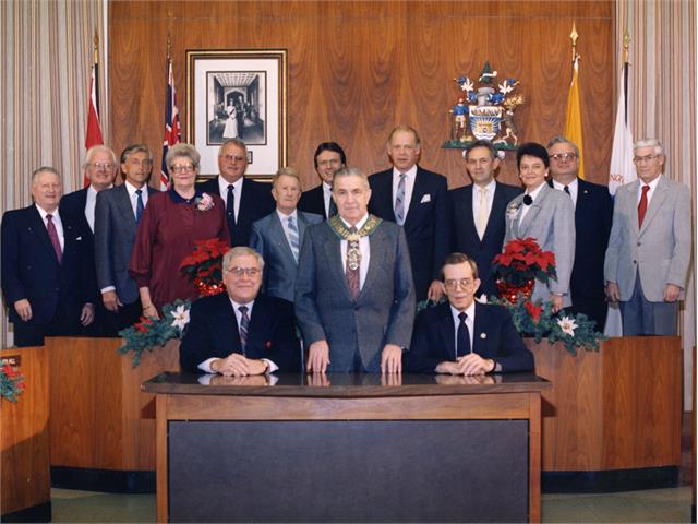 1988 TB Council The 1988 City Council of Thunder Bay stand and sit together in an official portrait with the mayor in the centre