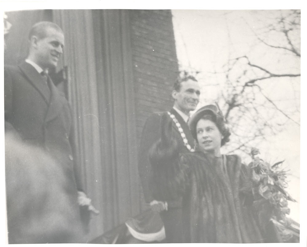 Princess Elizabeth and the Duke of Edinburgh greeting the crowd with the Mayor of Fort William, 1951 Princess Elizabeth waving, with the Duke of Edinburgh and Mayor of Fort William